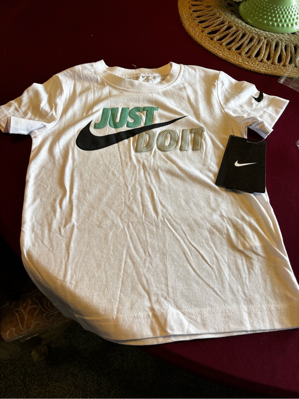 Nike White Tee with Black Swoosh and Green "JUST" Accent